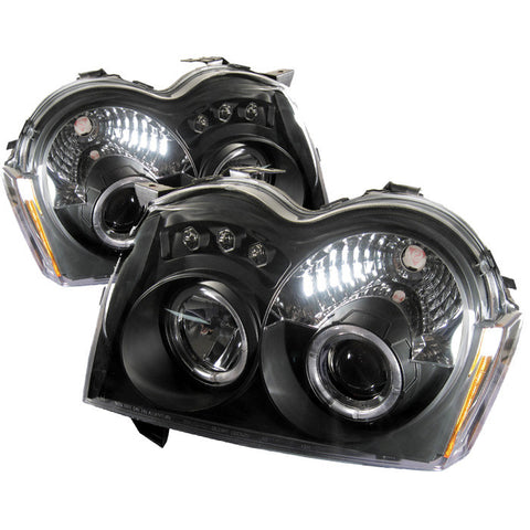 Jeep Grand Cherokee 05-07 Projector Headlights - LED Halo - LED ( Replaceable LEDs ) - Black - High H1 (Included) - Low 9006 (Not Included)